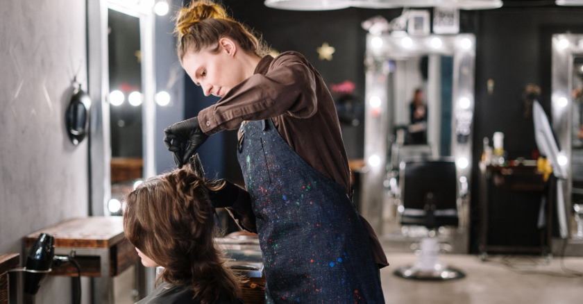 Women Stylist Combing and Cutting Female Client Hair - Stylists Pay Stylists